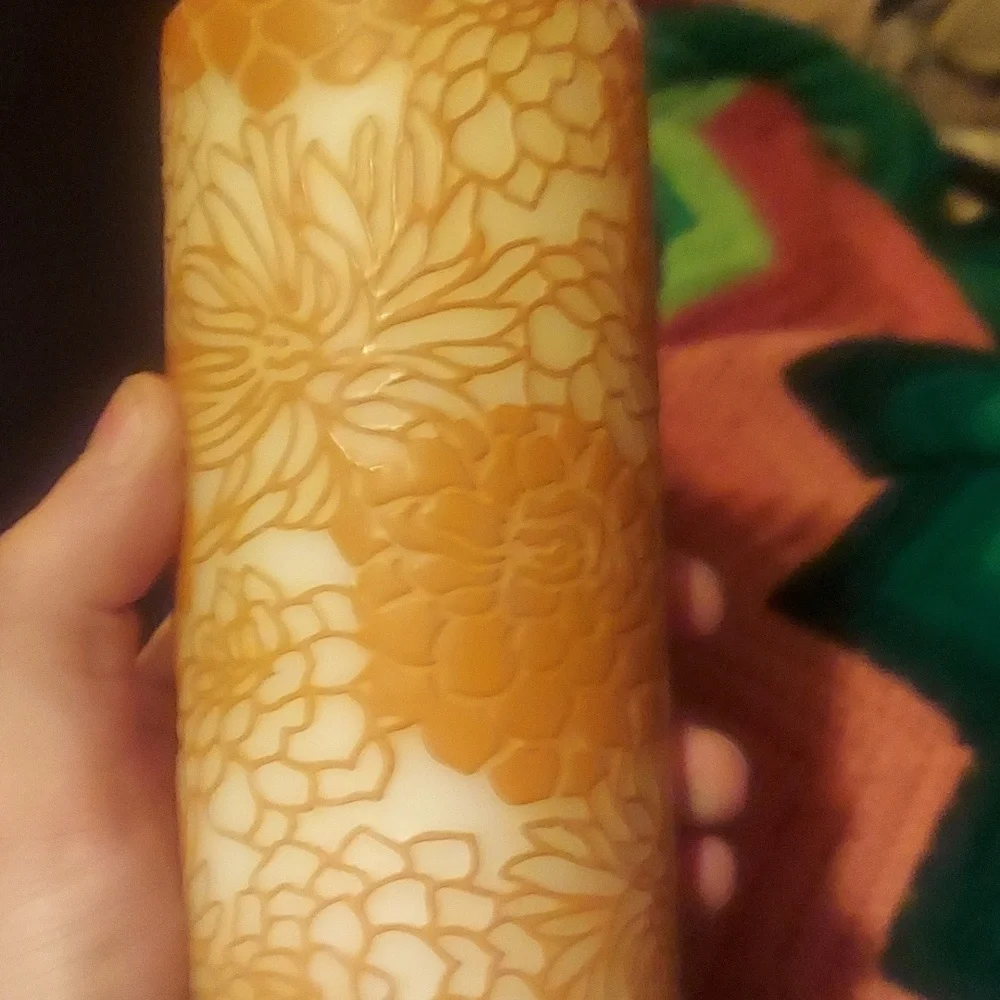 Nwot premium unscented floral pillar candles. Set of 2.